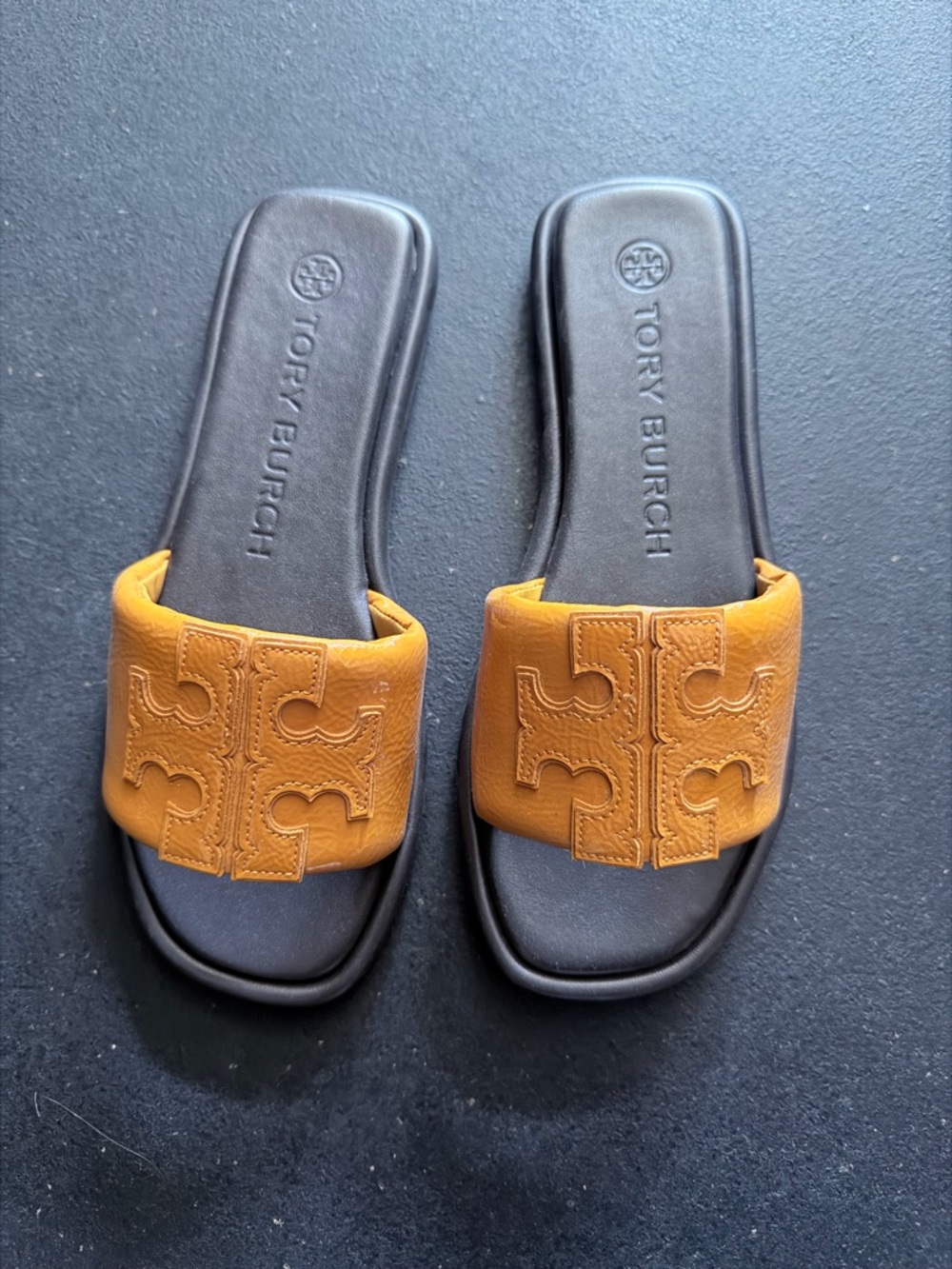 Tory Burch Black Footbed Slide Sandals with Tan Logo Strap.  Brand new